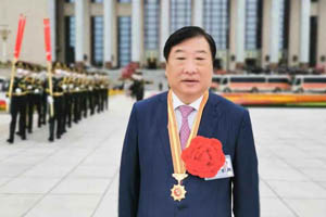 谭旭光被授予“全国优秀共产党员”称号